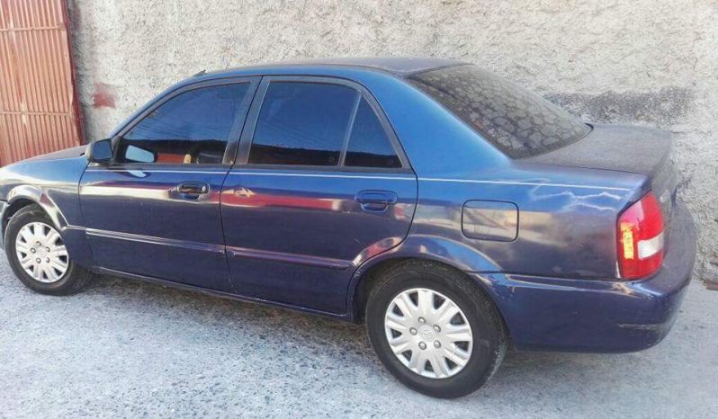 Mazda Protege 2000, motor 1600, automático, aire acondicionado, vidrios eléctricos. Servicio reciente. Papeles en orden. Negociable