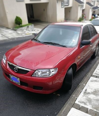 Mazda 323 2002 color rojo, de agencia, motor 1300, un solo dueño. El carro es 323, lo coloque en 3 porque no me aparece la opcion de 323.